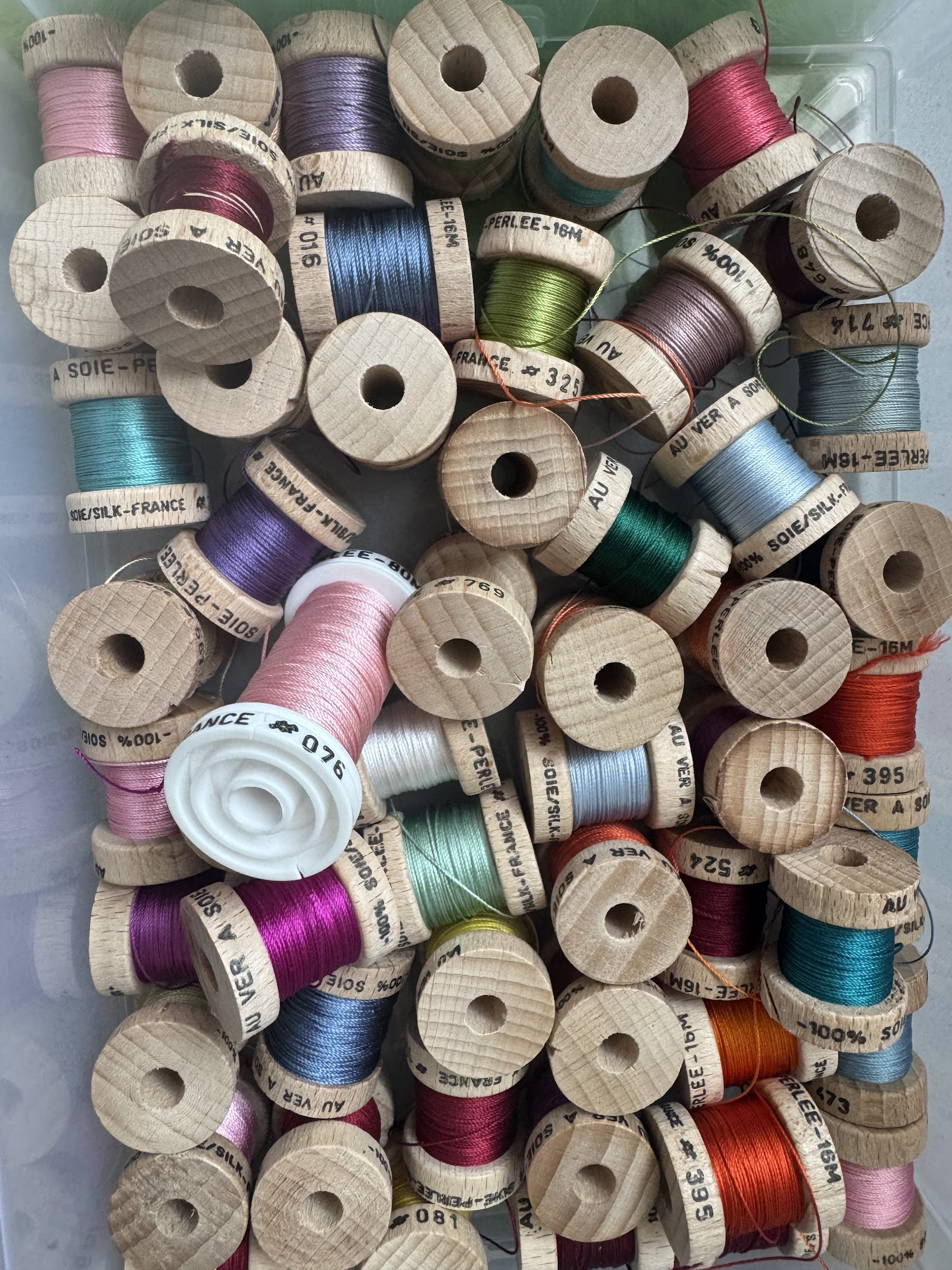 Au Ver à Soie silk embroidery floss on wooden spools